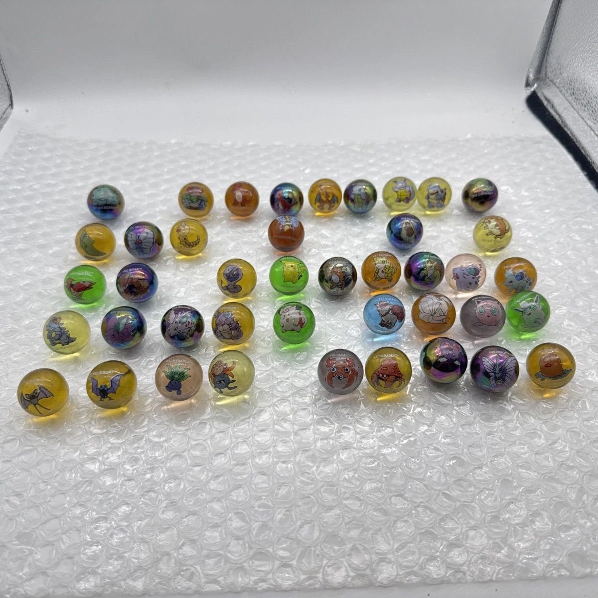 Official Pokémon bulk merchand - огляд і ціна Vintage Collectible Marbles